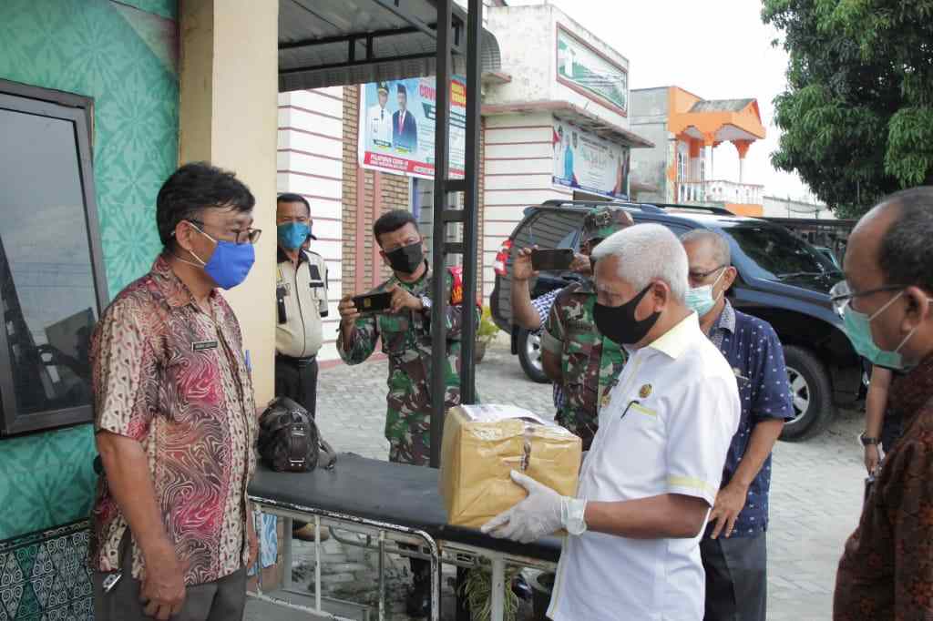 Bupati Asahan Sudah Bagikan Bantuan APD dari Provsu kepada Puskesmas