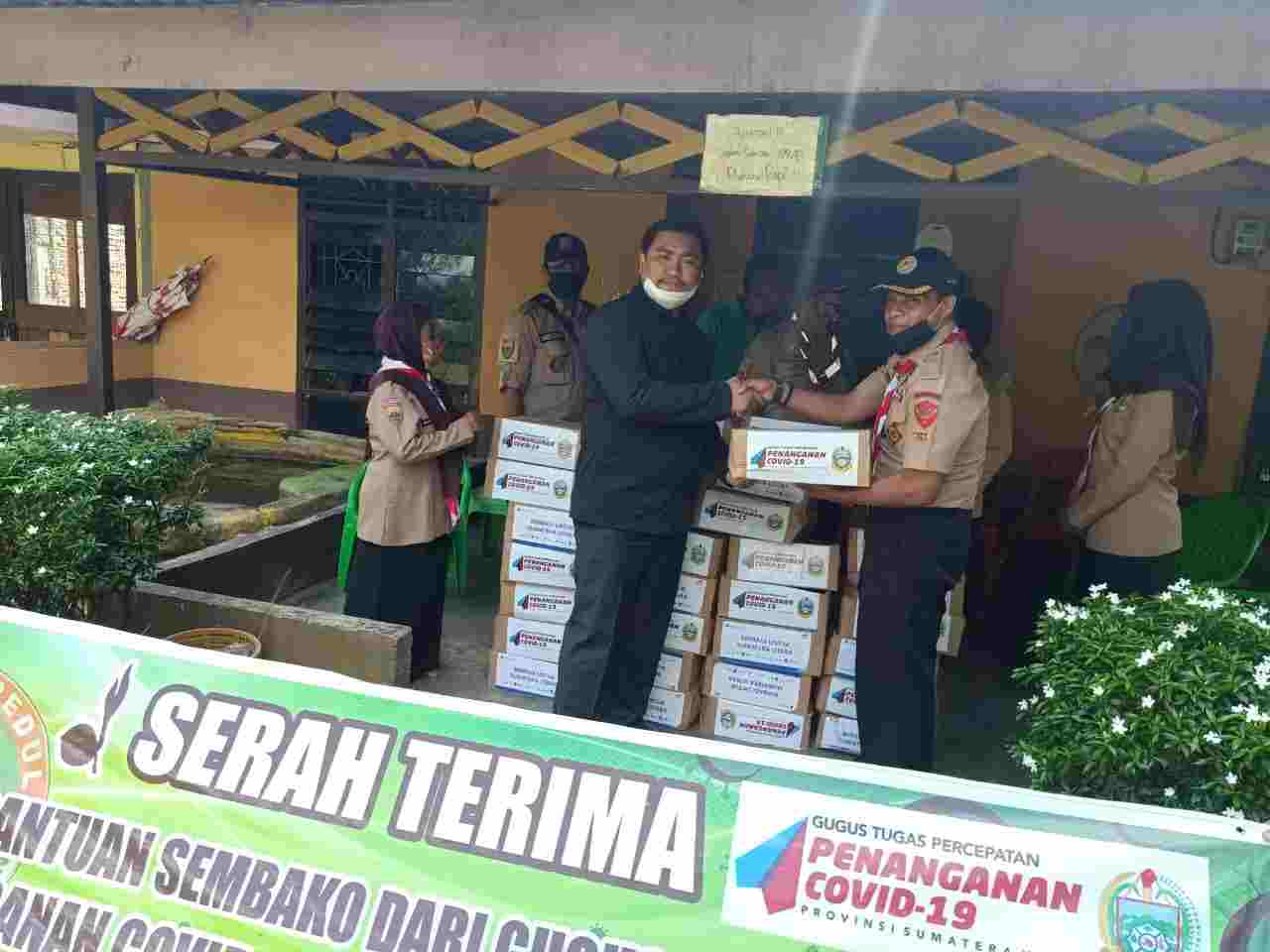 Pramuka Sumatera Utara Bagikan Seribu Paket Sembako kepada 28 Kwarcab