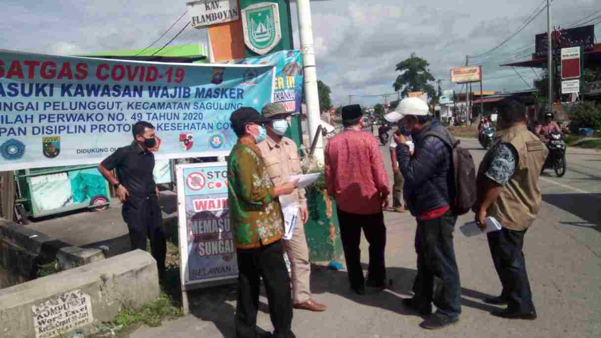 Tim Relawan Covid-19 Sosialisasi Denda dan Sanksi Bagi Warga Batam yang Melanggar Protokol Kesehatan