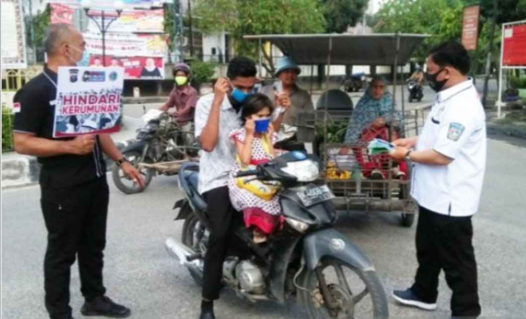 Sat Narkoba Polres Tanjungbalai Bagikan Masker
