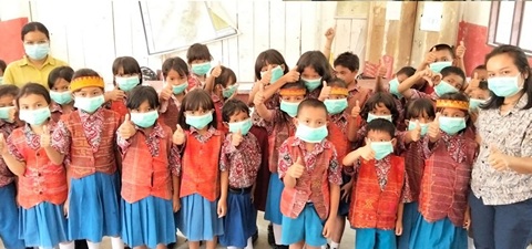 Kabut Asap Melanda, Puskesmas di Taput Bagikan Masker ke Pelajar